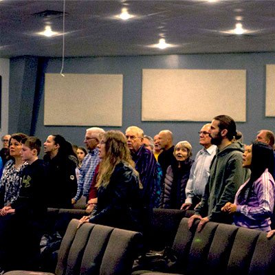 folks_worshipping_at_service folks_worshipping_at_service
